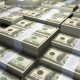 3D rendering of a large stack of one hundred US Dollars bills.